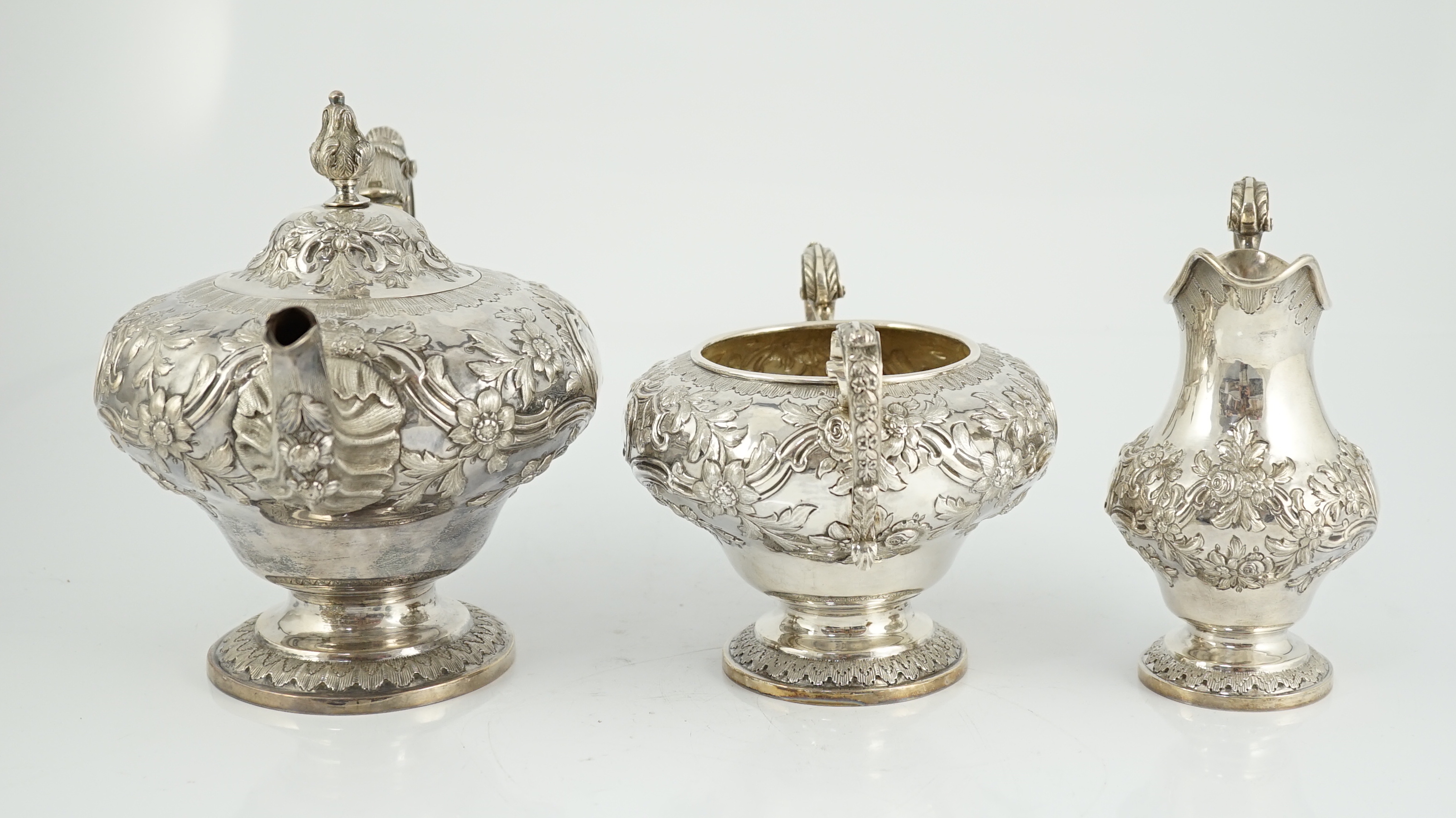 A Victorian silver inverted pear shaped three piece tea set by John Wellby